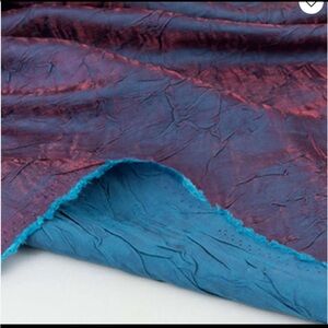 Luxurious iridescent creased metallic fabric